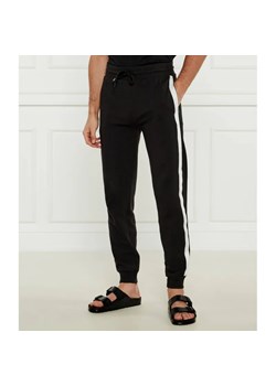 Tommy Hilfiger Spodnie dresowe | Regular Fit ze sklepu Gomez Fashion Store w kategorii Piżamy męskie - zdjęcie 184504660