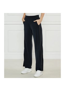 EA7 Spodnie dresowe | flare fit ze sklepu Gomez Fashion Store w kategorii Spodnie damskie - zdjęcie 184505090