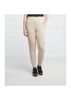 GUESS Spodnie dresowe SIMONNE | Regular Fit ze sklepu Gomez Fashion Store w kategorii Spodnie damskie - zdjęcie 184505720