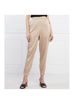 GUESS Spodnie JAY | Loose fit ze sklepu Gomez Fashion Store w kategorii Spodnie damskie - zdjęcie 184506274