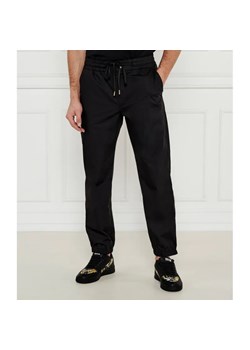 Versace Jeans Couture Spodnie jogger | Regular Fit ze sklepu Gomez Fashion Store w kategorii Spodnie męskie - zdjęcie 184509652