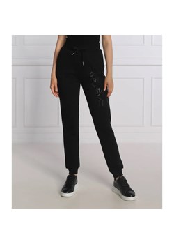 Armani Exchange Spodnie dresowe | Regular Fit ze sklepu Gomez Fashion Store w kategorii Spodnie damskie - zdjęcie 184511683