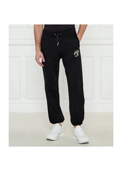 Guess Jeans Spodnie dresowe | Regular Fit ze sklepu Gomez Fashion Store w kategorii Spodnie męskie - zdjęcie 184511940