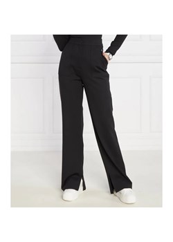 Calvin Klein Jeans Spodnie dresowe MILANO | flare fit ze sklepu Gomez Fashion Store w kategorii Spodnie damskie - zdjęcie 184512413