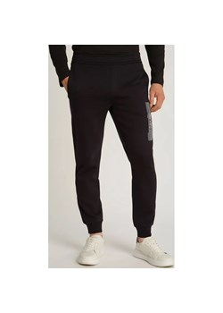 Calvin Klein Spodnie dresowe HORIZONTAL | Regular Fit ze sklepu Gomez Fashion Store w kategorii Spodnie męskie - zdjęcie 184512670