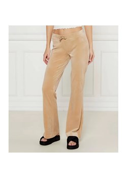 Juicy Couture Spodnie dresowe CHRISTINE | flare fit | low rise ze sklepu Gomez Fashion Store w kategorii Spodnie damskie - zdjęcie 184512753
