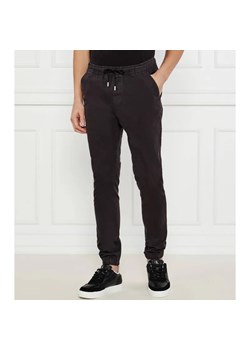 Tommy Jeans Spodnie jogger AUSTIN | Regular Fit ze sklepu Gomez Fashion Store w kategorii Spodnie męskie - zdjęcie 184512803
