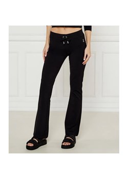 Juicy Couture Spodnie dresowe APOLLO | flare fit | low rise ze sklepu Gomez Fashion Store w kategorii Spodnie damskie - zdjęcie 184512940