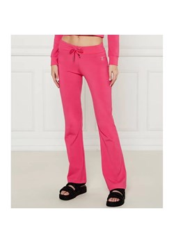 Juicy Couture Spodnie dresowe APOLLO | flare fit | low rise ze sklepu Gomez Fashion Store w kategorii Spodnie damskie - zdjęcie 184513034
