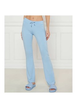 Juicy Couture Spodnie dresowe APOLLO | flare fit | low rise ze sklepu Gomez Fashion Store w kategorii Spodnie damskie - zdjęcie 184513133
