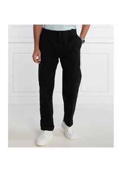 Calvin Klein Jeans Spodnie BADGE TRIM WOVEN PANT | Regular Fit ze sklepu Gomez Fashion Store w kategorii Spodnie męskie - zdjęcie 184515090