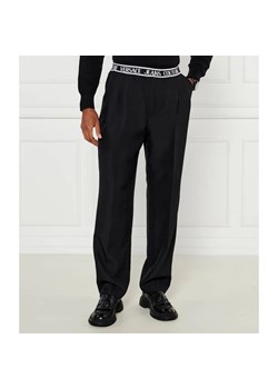 Versace Jeans Couture Spodnie EL LOGO | Loose fit ze sklepu Gomez Fashion Store w kategorii Spodnie męskie - zdjęcie 184515323