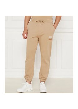 HUGO Spodnie dresowe Dusplitan | Loose fit ze sklepu Gomez Fashion Store w kategorii Spodnie męskie - zdjęcie 184516483