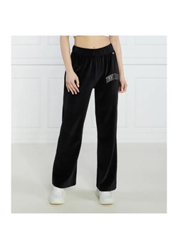 Tommy Jeans Spodnie dresowe TJW RHINESTONE VELOUR SWEATPANT | Relaxed fit ze sklepu Gomez Fashion Store w kategorii Spodnie damskie - zdjęcie 184518900