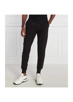 Tommy Hilfiger Spodnie dresowe | Regular Fit ze sklepu Gomez Fashion Store w kategorii Spodnie męskie - zdjęcie 184519364