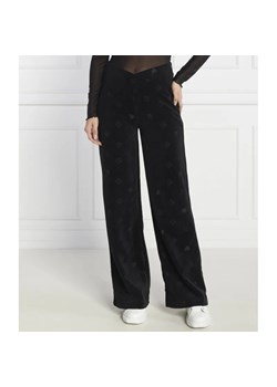 HUGO Spodnie dresowe Navalia | flare fit ze sklepu Gomez Fashion Store w kategorii Spodnie damskie - zdjęcie 184519912