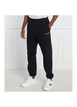 Tommy Hilfiger Spodnie dresowe MONOTYPE EMBRO SWEATPANT | Regular Fit ze sklepu Gomez Fashion Store w kategorii Spodnie męskie - zdjęcie 184520074