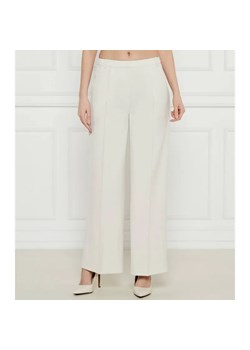 Calvin Klein Spodnie | flare fit | mid rise ze sklepu Gomez Fashion Store w kategorii Spodnie damskie - zdjęcie 184520312