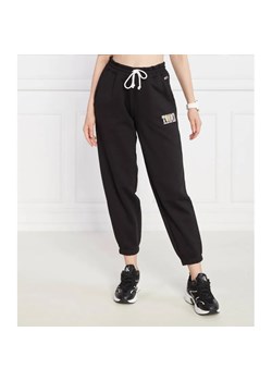 Tommy Jeans Spodnie dresowe TJW TJ LUXE 2 | Regular Fit ze sklepu Gomez Fashion Store w kategorii Spodnie damskie - zdjęcie 184520403