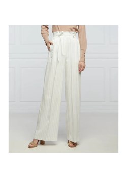 Liu Jo Spodnie | flare fit | z dodatkiem lnu ze sklepu Gomez Fashion Store w kategorii Spodnie damskie - zdjęcie 184522603