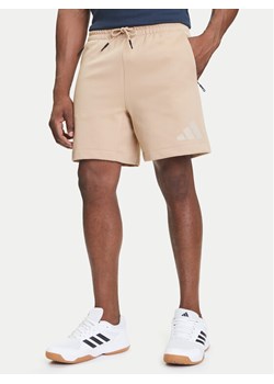 adidas Szorty sportowe Z.N.E. JW4744 Beżowy Regular Fit ze sklepu MODIVO w kategorii Spodenki męskie - zdjęcie 184553543