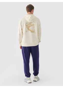 Męskie spodnie dresowe joggery 4F 4FWMM00TTROM1139 - granatowe ze sklepu Sportstylestory.com w kategorii Spodnie męskie - zdjęcie 184564022