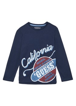 Guess Bluzka L5YI26 K8HM4 Granatowy Regular Fit ze sklepu MODIVO w kategorii T-shirty chłopięce - zdjęcie 184591673