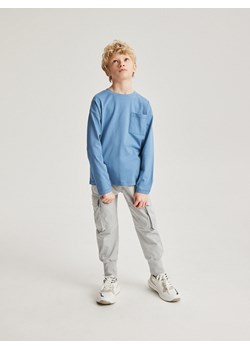 Reserved - Longsleeve oversize z kieszenią - granatowy ze sklepu Reserved w kategorii T-shirty chłopięce - zdjęcie 184601021
