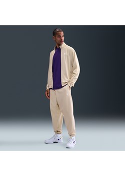 Spodnie do koszykówki Therma-FIT Kobe - Brązowy ze sklepu Nike poland w kategorii Spodnie męskie - zdjęcie 184611340