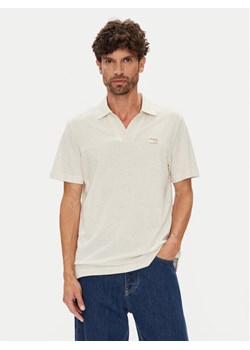 Tommy Jeans Polo Skipper DM0DM21657 Beżowy Regular Fit ze sklepu MODIVO w kategorii T-shirty męskie - zdjęcie 184613271