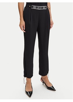 Liu Jo Sport Spodnie materiałowe TF5192 T004A Czarny Regular Fit ze sklepu MODIVO w kategorii Spodnie damskie - zdjęcie 184629064