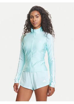 adidas Bluza adicolor 3-Stripes JC5579 Turkusowy Slim Fit ze sklepu MODIVO w kategorii Bluzy damskie - zdjęcie 184629131