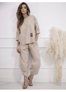 KOMPLET OVERSIZE SPODNIE+ T-SHIRT- BEŻOWY ze sklepu olika.com.pl w kategorii Dresy damskie - zdjęcie 184630130