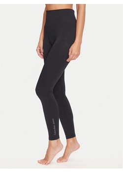 Calvin Klein Jeans Legginsy 701229798 Czarny Slim Fit ze sklepu MODIVO w kategorii Spodnie damskie - zdjęcie 184632684