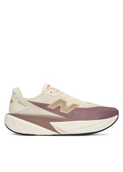 New Balance Buty do biegania FuelCell Rebell V5 MFCXLY5 Beżowy ze sklepu MODIVO w kategorii Buty sportowe męskie - zdjęcie 184644592