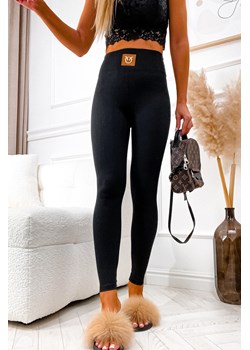 LEGGINSY PRĄŻKOWANE Z OZDOBNYMI JASKÓŁKAMI- CZARNE ze sklepu olika.com.pl w kategorii Spodnie damskie - zdjęcie 184647030