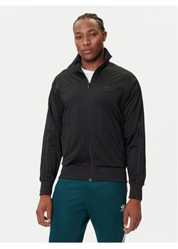 adidas Bluza adicolor Classics Firebird JY1347 Czarny Loose Fit ze sklepu MODIVO w kategorii Bluzy męskie - zdjęcie 184653372