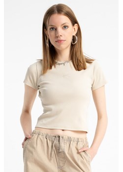 Kremowy crop top z dzianiny prążkowanej, kolor - kremowy, rozmiar - 140 ze sklepu REPORTER w kategorii Bluzki dziewczęce - zdjęcie 184668711
