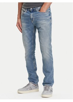 Tommy Jeans Jeansy Scanton DM0DM21005 Niebieski Slim Fit ze sklepu MODIVO w kategorii Jeansy męskie - zdjęcie 184670294