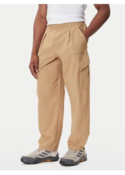 adidas Spodnie outdoor Terrex Xploric JM7424 Beżowy Loose Fit ze sklepu MODIVO w kategorii Spodnie męskie - zdjęcie 184701702