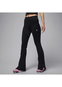Damskie legginsy ze średnim stanem i lekko rozszerzanymi nogawkami Jordan Brooklyn Essentials - Czerń ze sklepu Nike poland w kategorii Spodnie damskie - zdjęcie 184704172