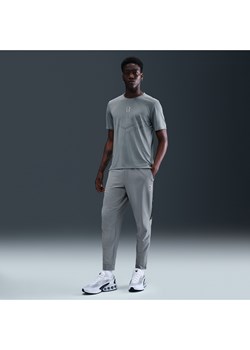 Męskie spodnie z tkaniny Nike Air Max - Szary ze sklepu Nike poland w kategorii Spodnie męskie - zdjęcie 184704213
