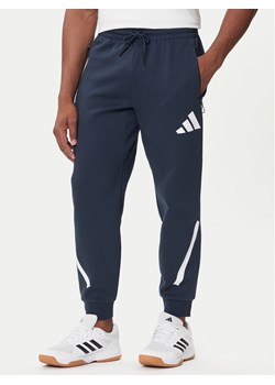 adidas Spodnie dresowe Z.N.E. JW4723 Granatowy Loose Fit ze sklepu MODIVO w kategorii Spodnie męskie - zdjęcie 184706901