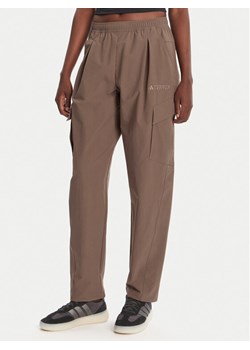 adidas Spodnie outdoor Terrex Xploric JM9857 Brązowy Loose Fit ze sklepu MODIVO w kategorii Spodnie damskie - zdjęcie 184709784