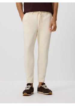 Reserved - Spodnie chino slim fit - złamana biel ze sklepu Reserved w kategorii Spodnie męskie - zdjęcie 184748644