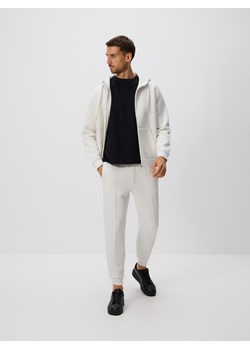 Reserved - Spodnie dresowe slim fit - złamana biel ze sklepu Reserved w kategorii Spodnie męskie - zdjęcie 184780634