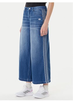 adidas Jeansy adicolor Denim Adilenium JV7454 Niebieski Wide Leg ze sklepu MODIVO w kategorii Jeansy damskie - zdjęcie 184787690