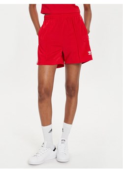 adidas Szorty sportowe Firebird IY7207 Czerwony Loose Fit ze sklepu MODIVO w kategorii Szorty - zdjęcie 184840734