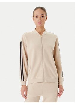 EA7 Emporio Armani Bluza 7W000566 AF15528 U1046 Beżowy Relaxed Fit ze sklepu MODIVO w kategorii Bluzy damskie - zdjęcie 184844141