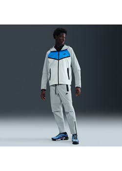 Męskie spodnie z tkaniny z luźnymi nogawkami Nike Tech - Szary ze sklepu Nike poland w kategorii Spodnie męskie - zdjęcie 184862883